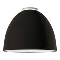 Black dome-shaped pendant lamp with a glossy finish and a contrasting white interior. Sleek and modern design.