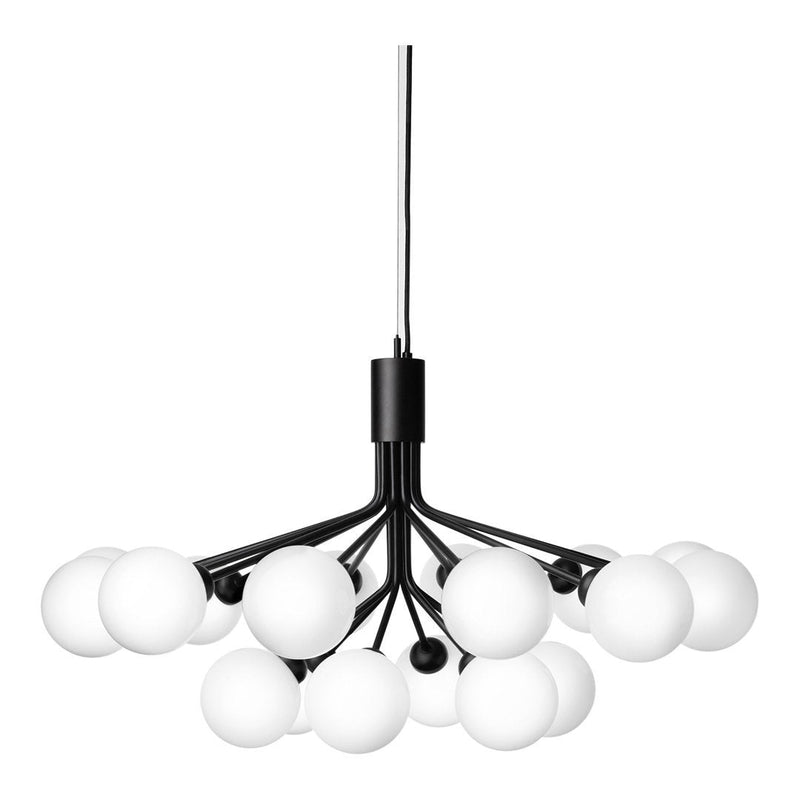 Black and white modern chandelier with spherical white glass shades and sleek black metal arms.