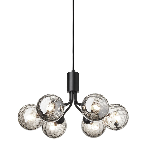 Black pendant light with six geometric, faceted glass shades in smoky gray. Modern and stylish lighting design.