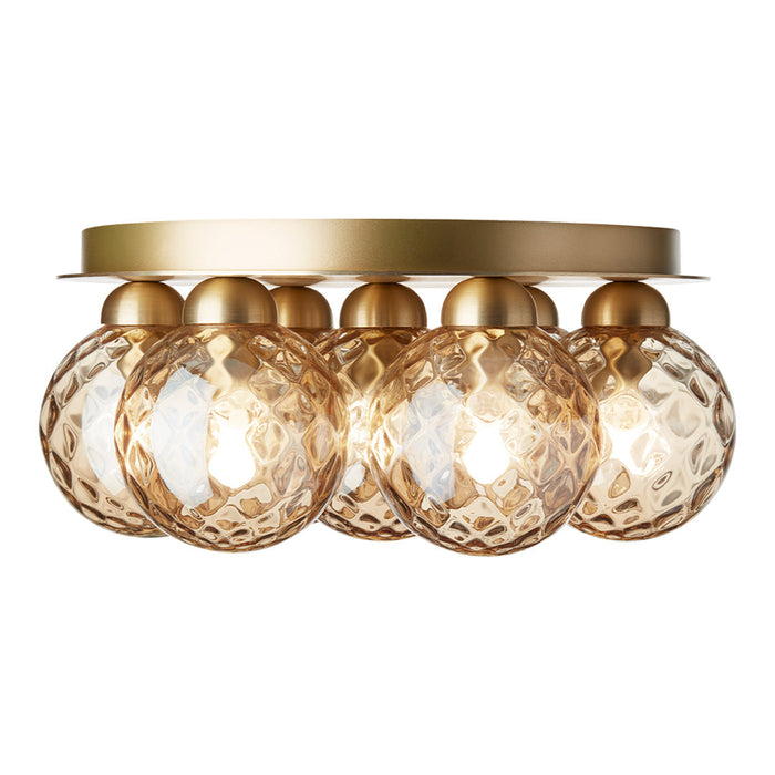 "Elegant gold ceiling light with textured amber glass shades and a sleek metallic base."