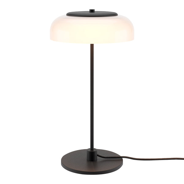 Black metal lamp with a smooth, white rounded shade and a sleek circular base. Minimalist design for modern decor.