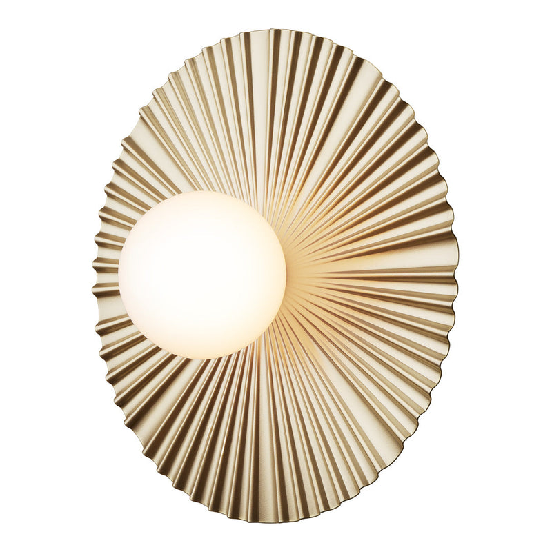 Gold sunburst wall sconce with textured radial patterns and a central globe light. Elegant and modern design.
