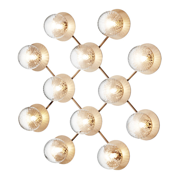Modern chandelier with gold accents and clear glass globes in a geometric pattern, adding elegance to any space.