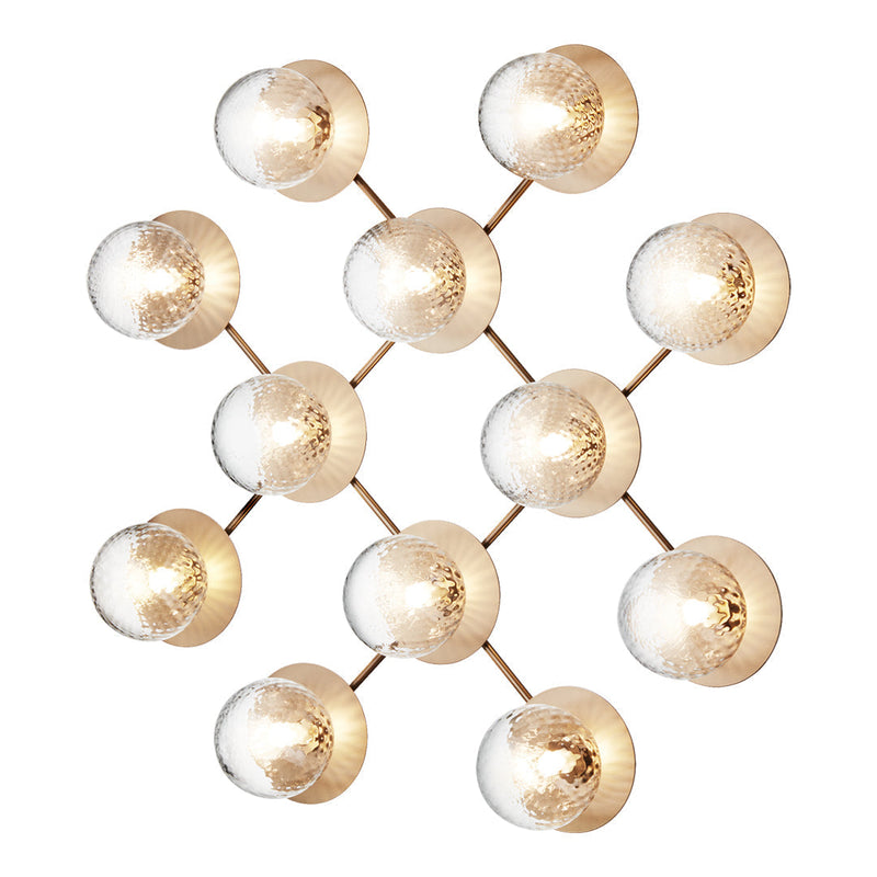 Modern chandelier with gold accents and clear glass globes in a geometric pattern, adding elegance to any space.
