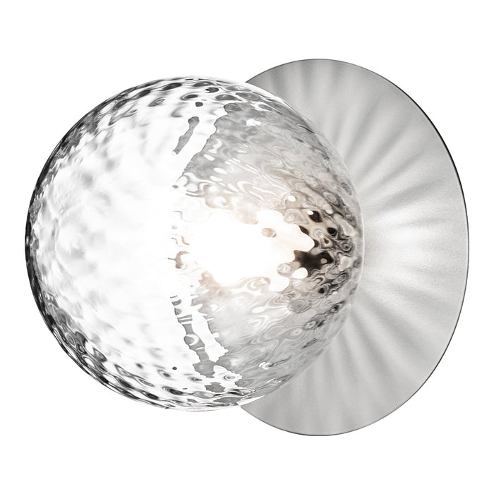 "Elegant glass wall sconce featuring a textured clear orb and a sleek, polished metal backplate."