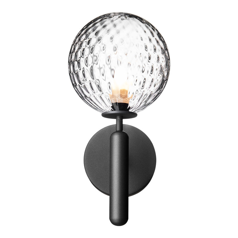Clear glass spherical shade with textured pattern, paired with a sleek black metal base for a modern look.