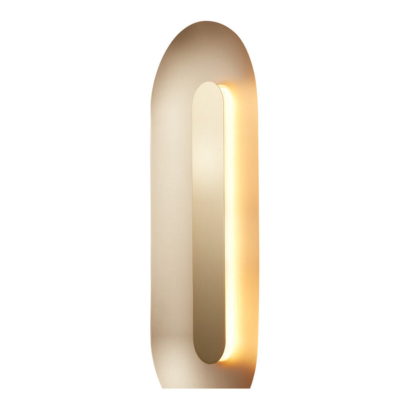 Modern, rounded wall lamp in soft beige, featuring a sleek, lighted interior for a minimalist aesthetic.