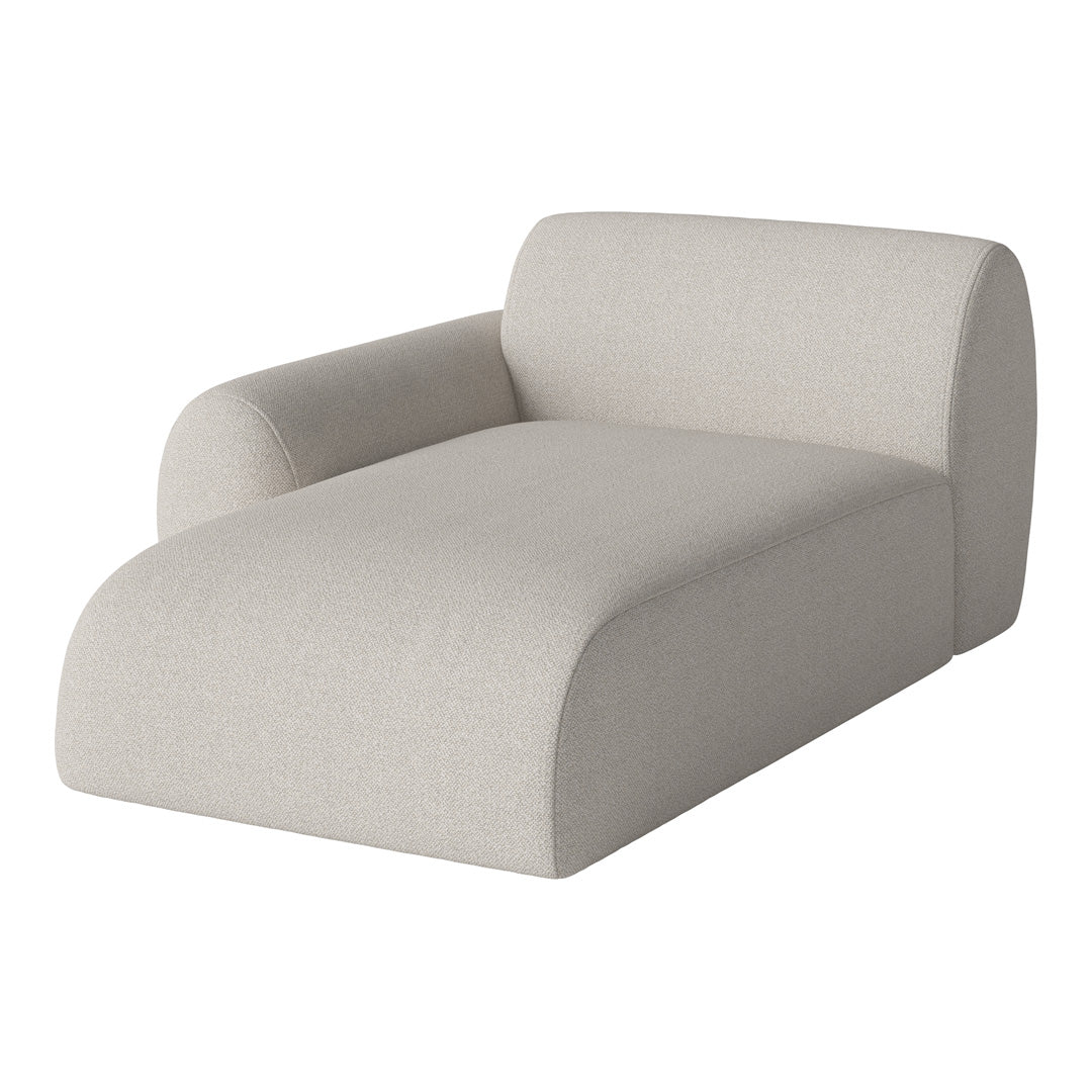 Light beige chaise lounge with a smooth, textured fabric and minimalist design. Perfect for modern interiors.