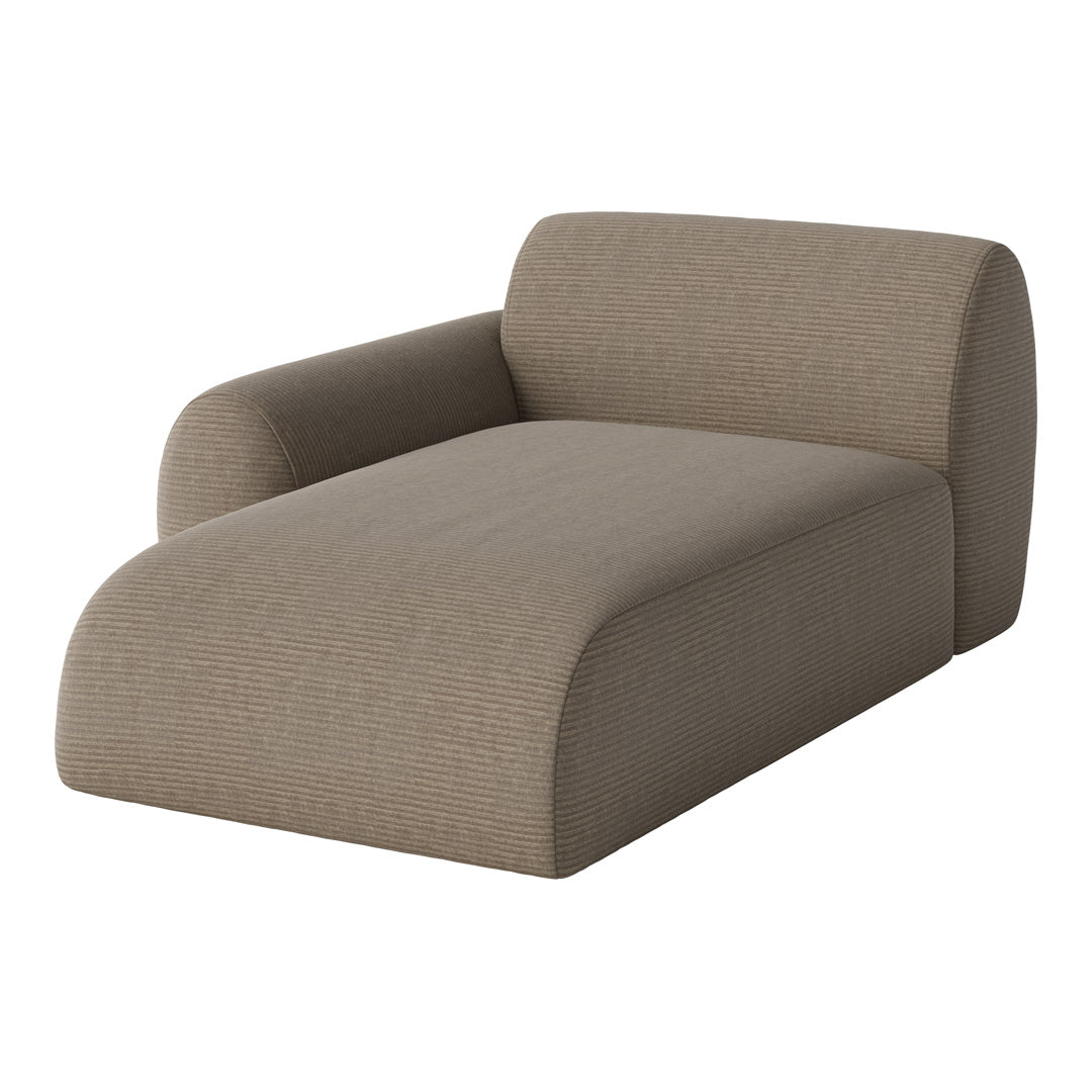 "Light brown chaise lounge with subtle ribbed texture and soft, rounded edges for a modern look."