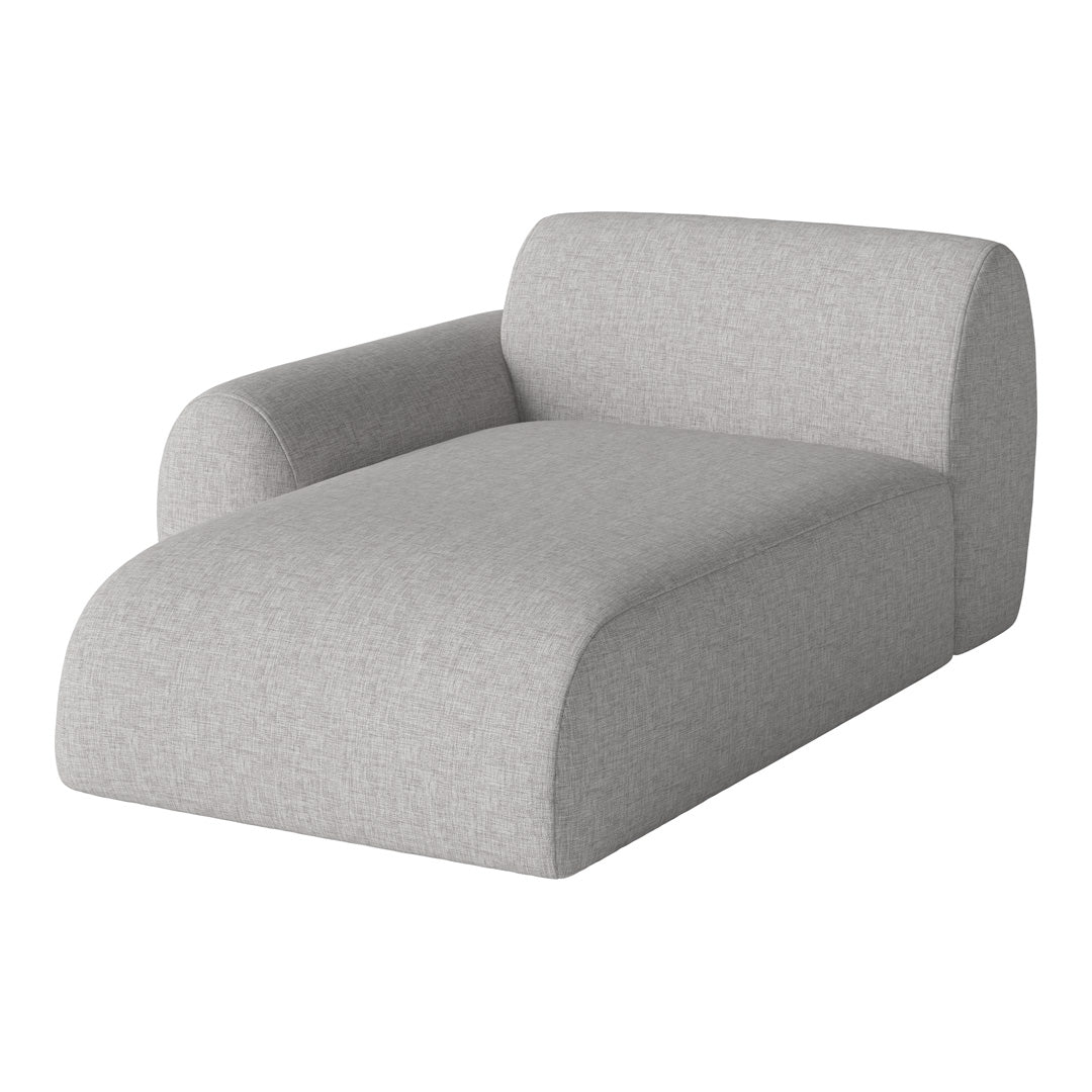 Light gray upholstered chaise lounge with a textured finish and soft, rounded edges. Modern, minimalist design.