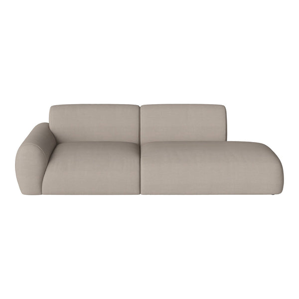 Beige sectional sofa with a smooth, minimalist design and rounded edges. Perfect for modern living spaces.