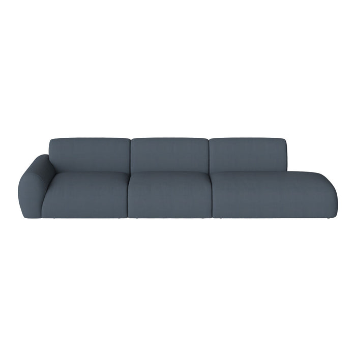 Soft dark blue sectional sofa with a smooth fabric texture and minimalistic design. Perfect for modern interiors.