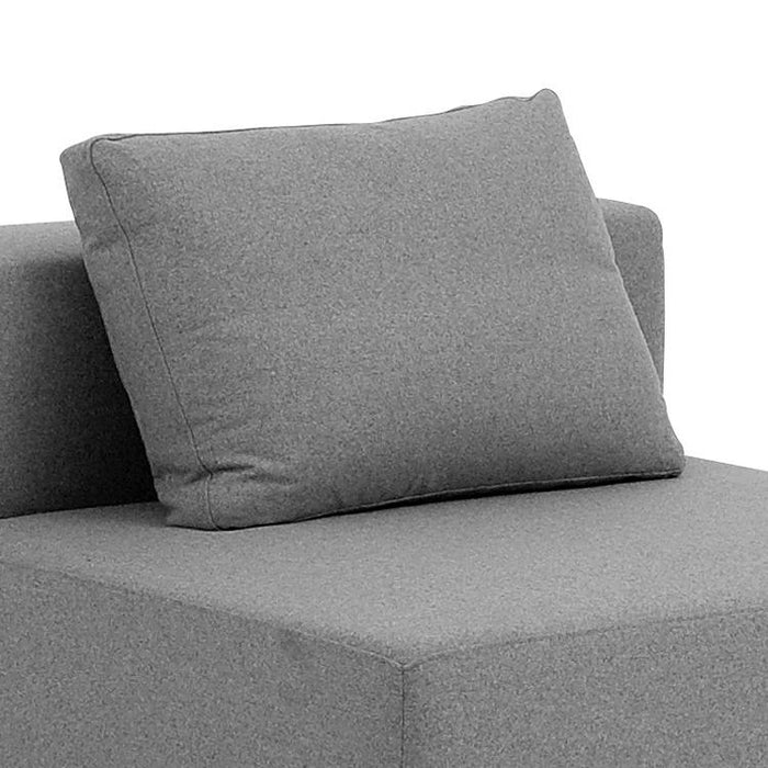 Gray sectional sofa with a textured fabric and matching gray cushion for a modern, stylish look.