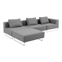 Gray modular sofa with sleek lines and soft cushions, featuring a minimalist design and chrome legs. Perfect for modern decor.