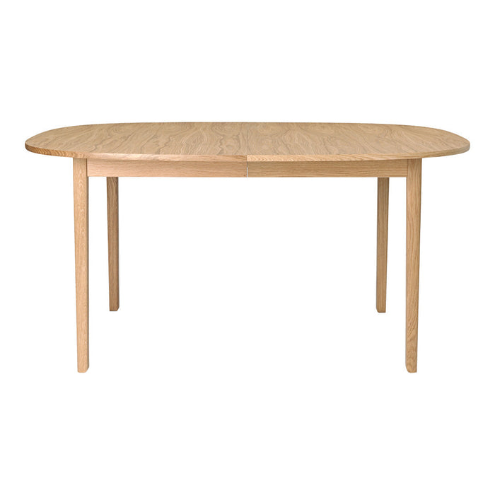 Light wood oval dining table with a smooth, natural finish and simple, clean lines. Perfect for modern interiors.