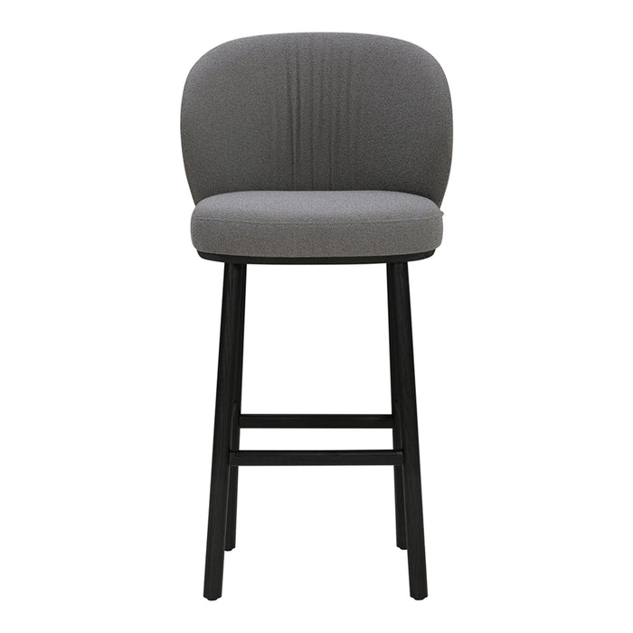 Gray upholstered bar stool with ribbed pattern and sleek black wooden legs. Modern and stylish home decor.