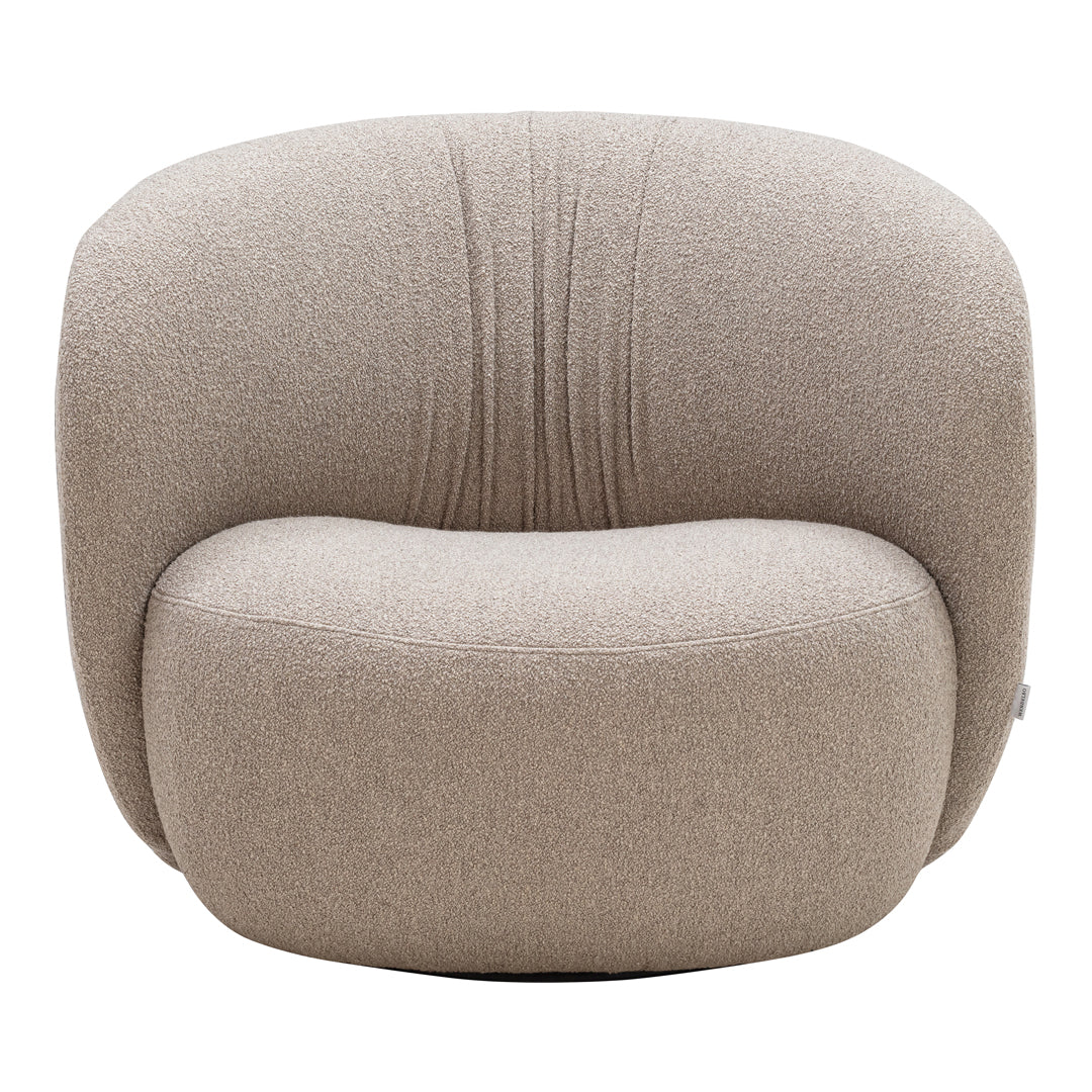 Beige boucle upholstered armchair with rounded shapes and subtle ribbed detailing. Perfect for modern, cozy interiors.