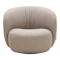 Beige boucle upholstered armchair with rounded shapes and subtle ribbed detailing. Perfect for modern, cozy interiors.
