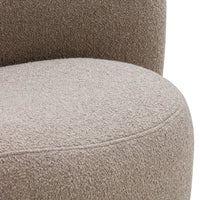 Beige textured upholstery with a soft, plush finish; curved silhouette enhances modern aesthetic.