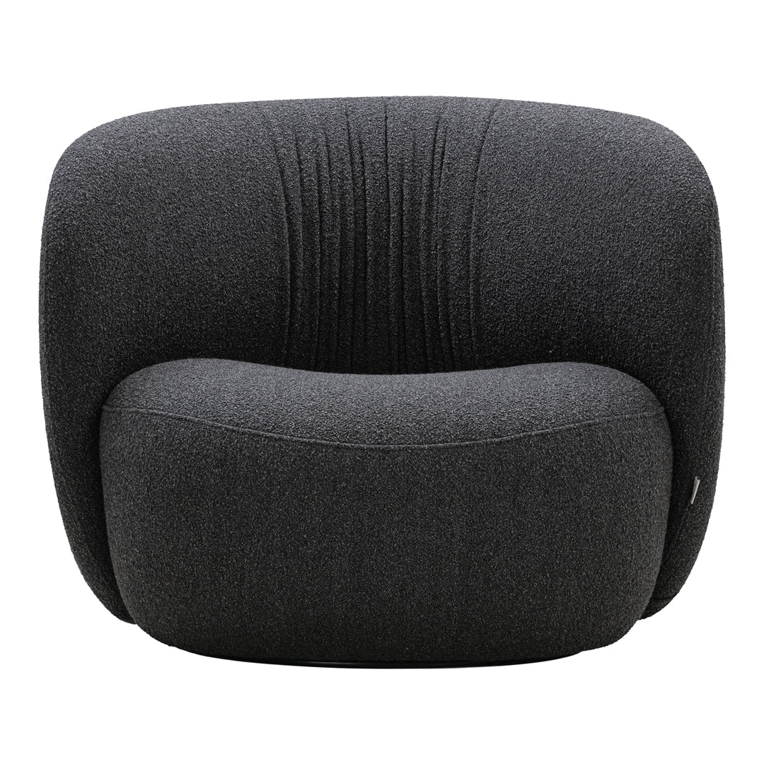Sleek dark gray armchair with subtle textured vertical lines, offering a modern and cozy aesthetic.