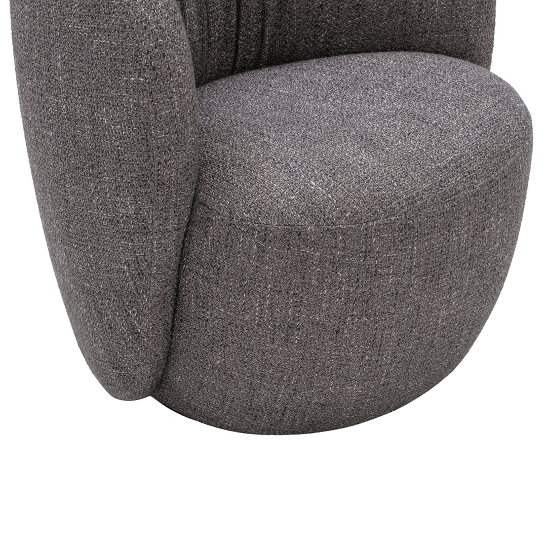 Gray upholstered chair with a soft, textured pattern, featuring rounded shapes and a modern design aesthetic.