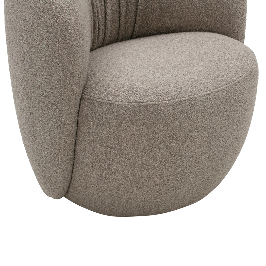 Gray textured fabric armchair with a smooth, rounded silhouette and plush upholstery, ideal for modern interiors.