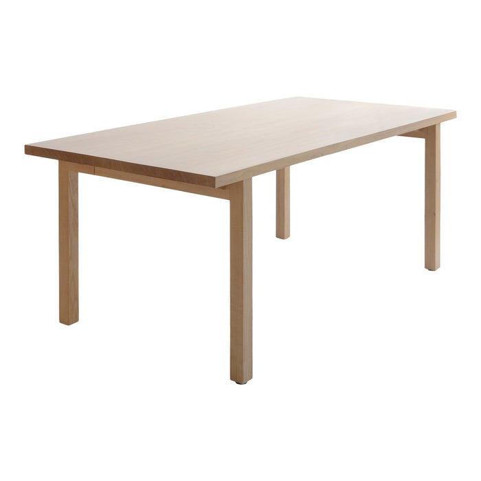 Natural light wood dining table with a smooth, light beige finish and minimalist design, perfect for modern interiors.