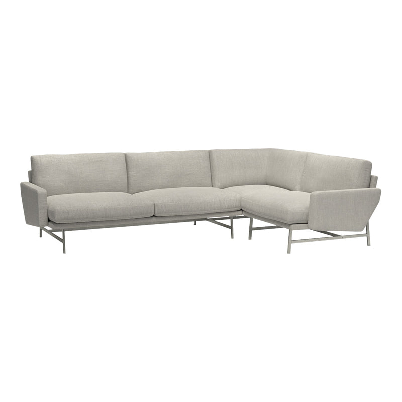 Light gray sectional sofa with smooth, textured fabric and sleek, modern metal legs. Ideal for contemporary living spaces.