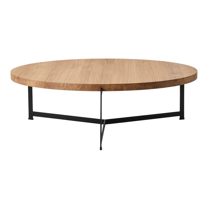 Round wooden coffee table with a natural oak finish and black metal legs. Minimalist design for modern interiors.
