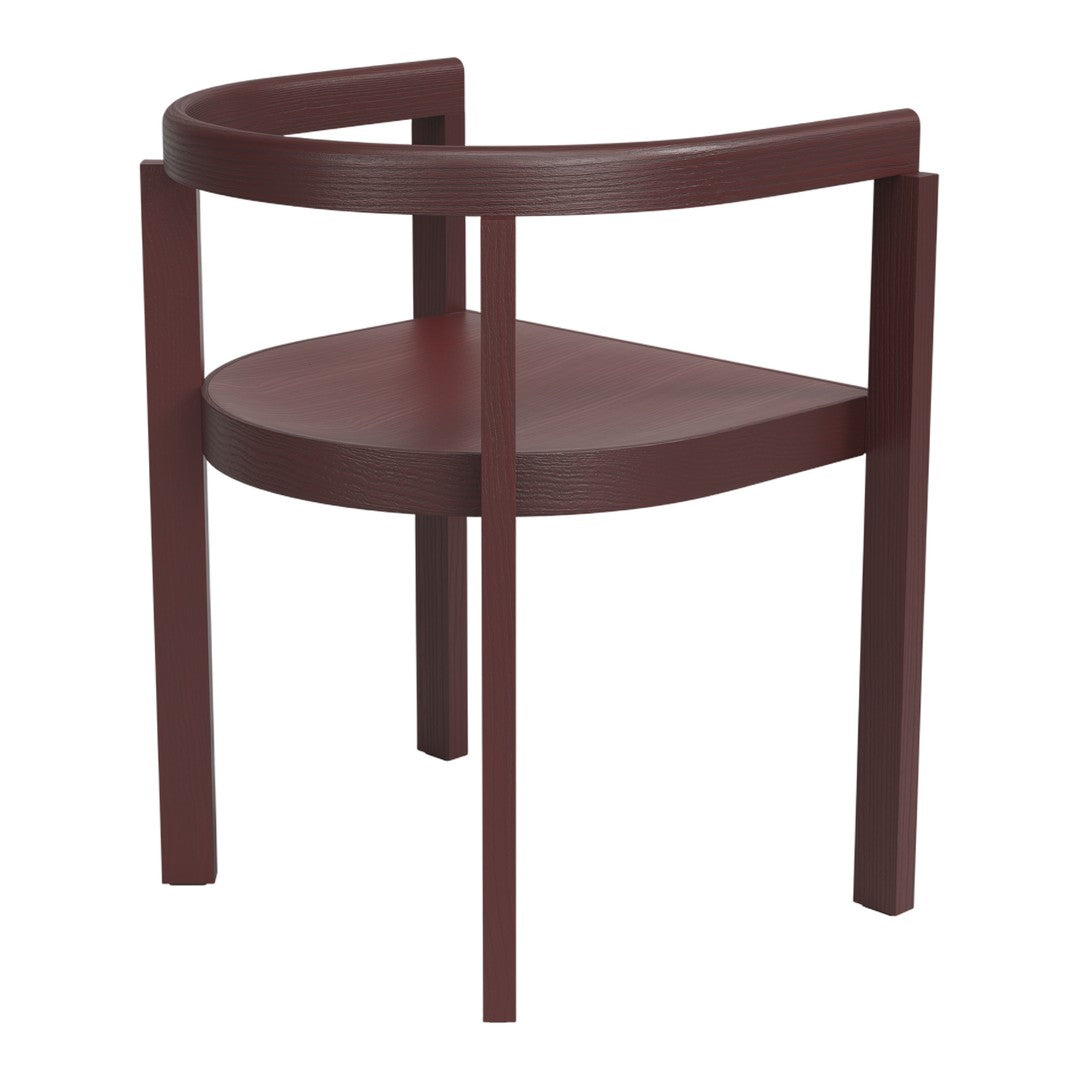 Rustic maroon wood chair with a minimalistic design and smooth, textured finish on the curved frame and seat.
