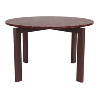 Round table with a deep burgundy marble top and textured brown legs, showcasing elegant patterns and rich colors.