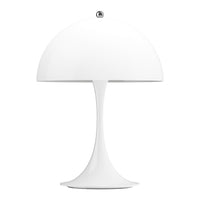 White Panthella table lamp with a round base and cylindrical shade on a white background