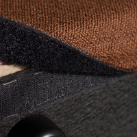 Brown and black textured fabric layers showcasing rich patterns and contrasting colors for a stylish design.