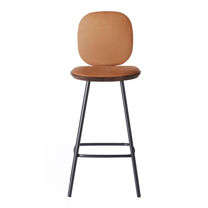 Tan leather seat with a smooth, rounded back on a sleek black metal frame. Minimalist design perfect for modern decor.