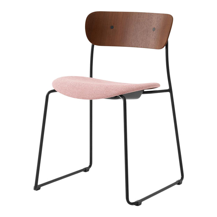 Modern chair featuring a warm wood backrest and soft pink seat on a sleek black metal frame. Minimalist design.