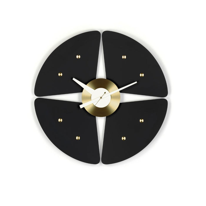 Modern black wall clock with a matte finish and gold accents, featuring a unique floral pattern.