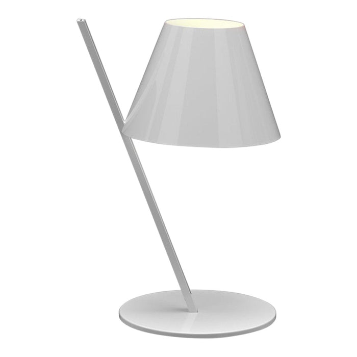 Modern white table lamp with a sleek conical shade and minimalist base. Elegant simplicity in a monochrome design.