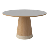 Round dining table with a sleek gray top and a natural wood base featuring a subtle textured finish.