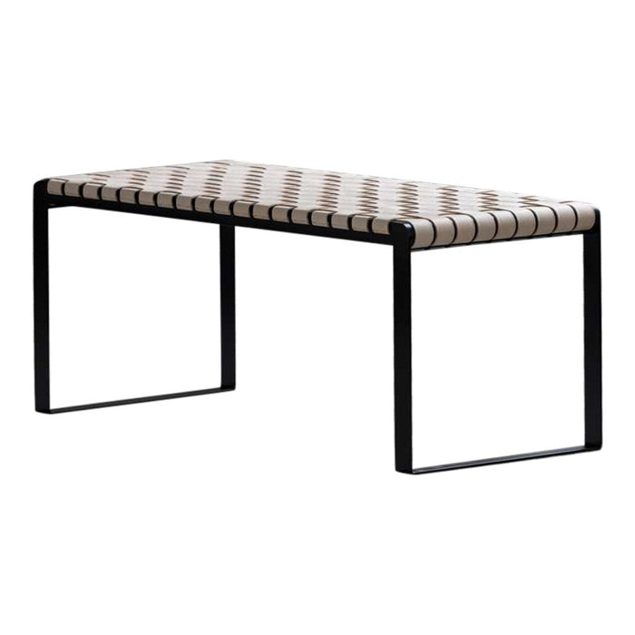 Striped beige and cream woven seating with a sleek black metal frame. Ideal for modern interiors.
