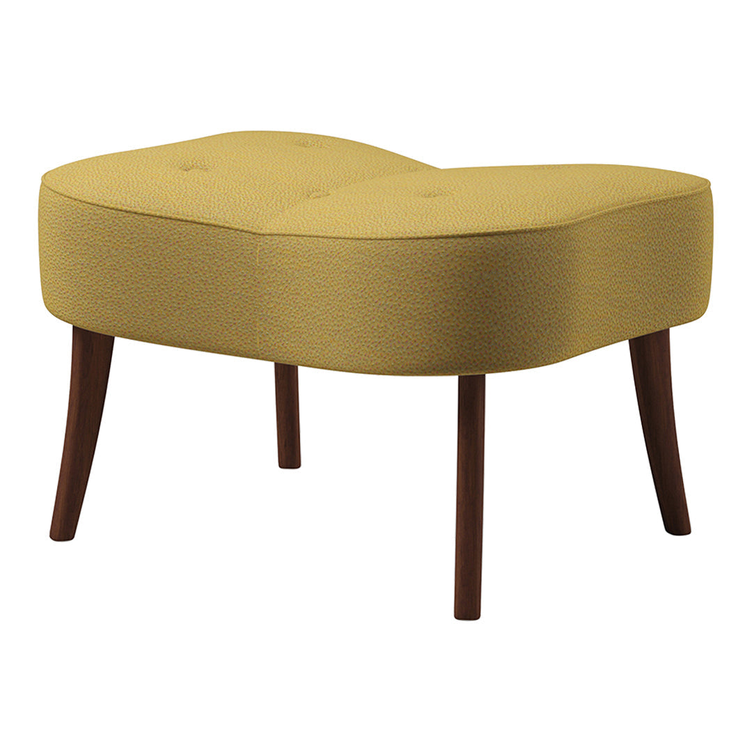 Yellow curved ottoman with tufted design and wooden legs, adding a modern touch to any space.