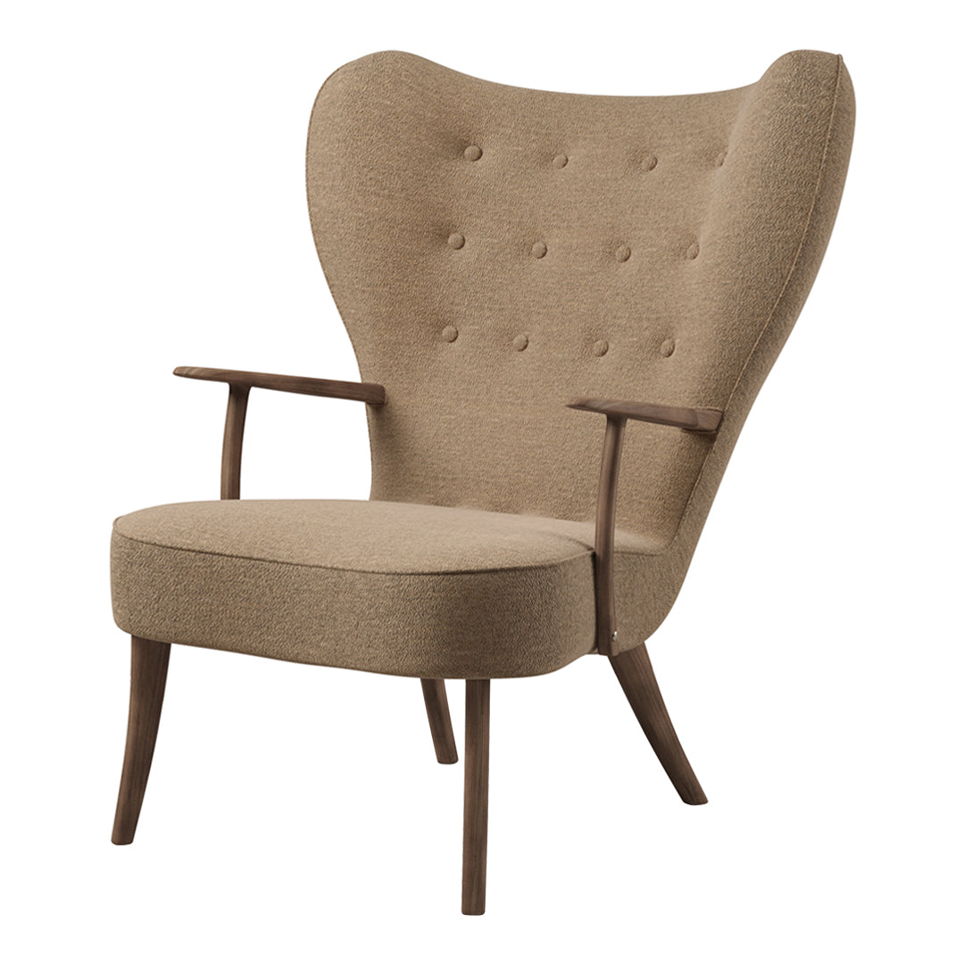 Light brown upholstered chair with tufted detailing and wooden arms, featuring a stylish wingback design.