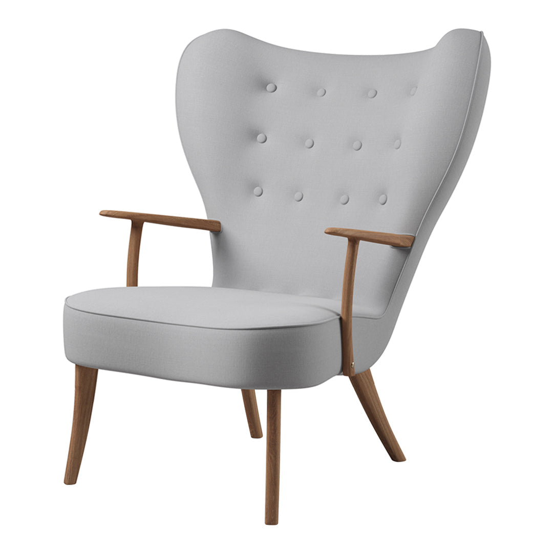 Heather gray armchair with tufted upholstery and wooden legs, featuring a minimalist and elegant design.
