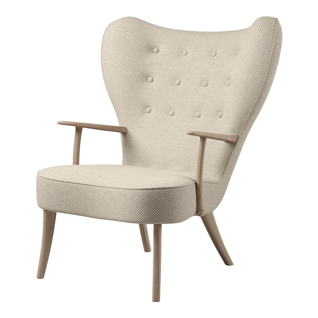 Beige upholstered armchair with tufted back and wooden legs, featuring a smooth, minimalist design.