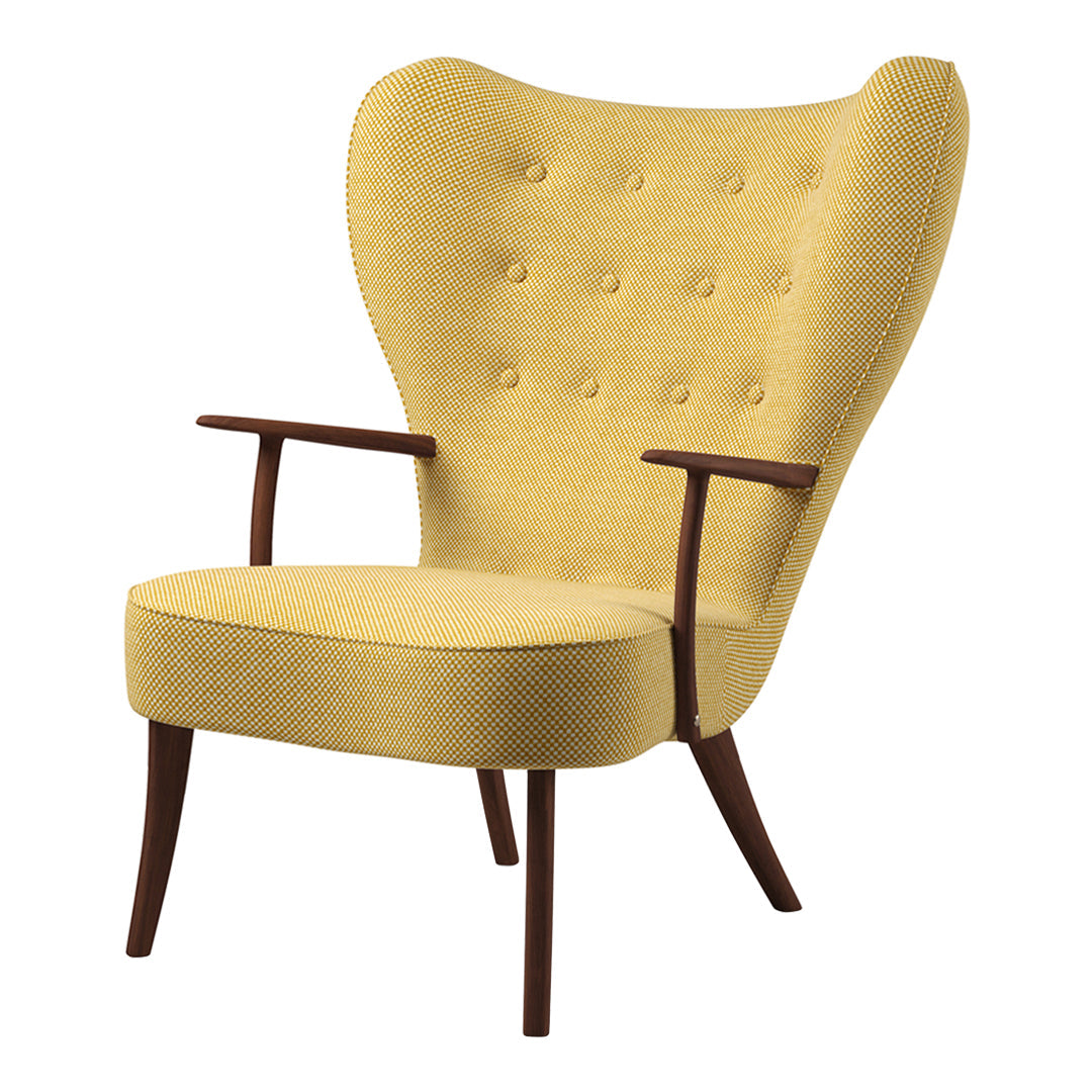 Yellow upholstered chair with tufted buttons and wooden legs, featuring a modern design and stylish silhouette.