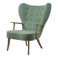 Green upholstered chair with a textured pattern and wooden armrests, featuring button detailing on the backrest.