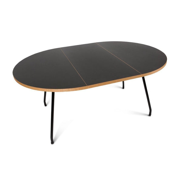 Black oval table with natural wood edge and sleek black metal legs. Modern and stylish design for any space.