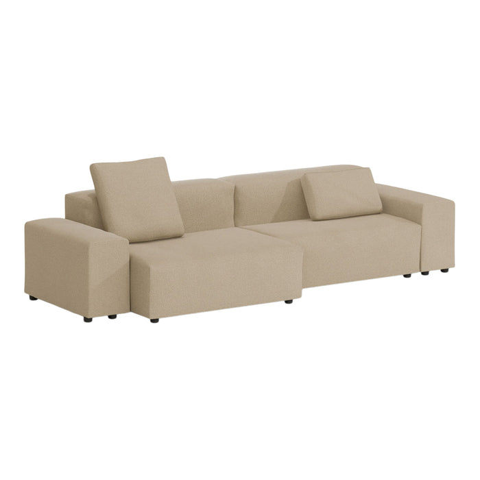 Beige sectional sofa with a minimalist design, featuring soft, textured fabric and smooth lines for a modern look.