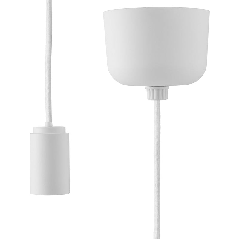 White pendant light fixture with smooth, minimalist design and matching cord, perfect for modern decor.