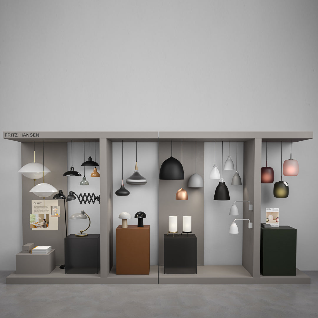 "Modern lamp display featuring neutral tones, black, white, amber, and green patterns."