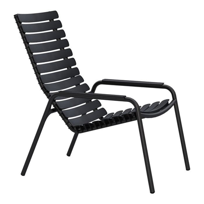 Black outdoor lounge chair with slatted design, featuring a modern and minimalist aesthetic. Perfect for stylish spaces.